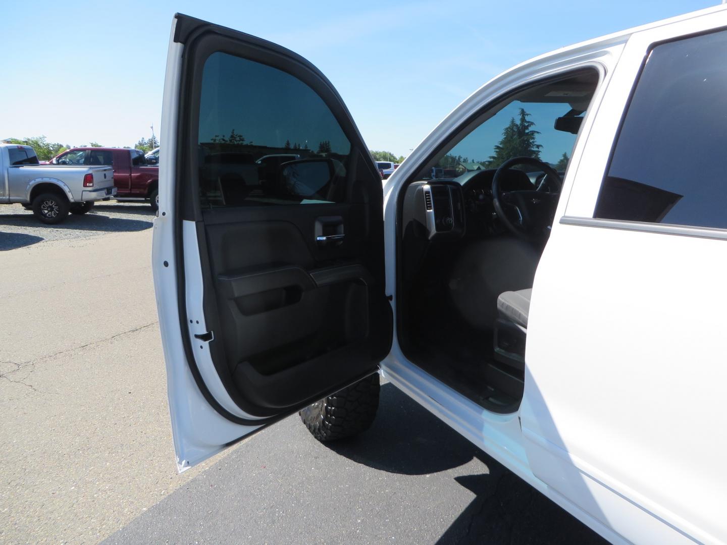 2018 White /BLACK Chevrolet Silverado 1500 LT (3GCPCREC7JG) with an 5.3L V8 OHV 16V engine, automatic transmission, located at 2630 Grass Valley Highway, Auburn, CA, 95603, (530) 508-5100, 38.937893, -121.095482 - Must see Pre Runner.... CST front lift spindals, Camburg UCA's, King Adjustable 2.5 Coil-overs, King 2.5 rear shocks, 35" Toyo RT Trail tires, 17" Method Race wheels, MZ front skid plate, G2 rear differntail cover, Full size bed mounted spare tire, Black Vinyl roof wrap, smoke tail lights and 3rd br - Photo#19